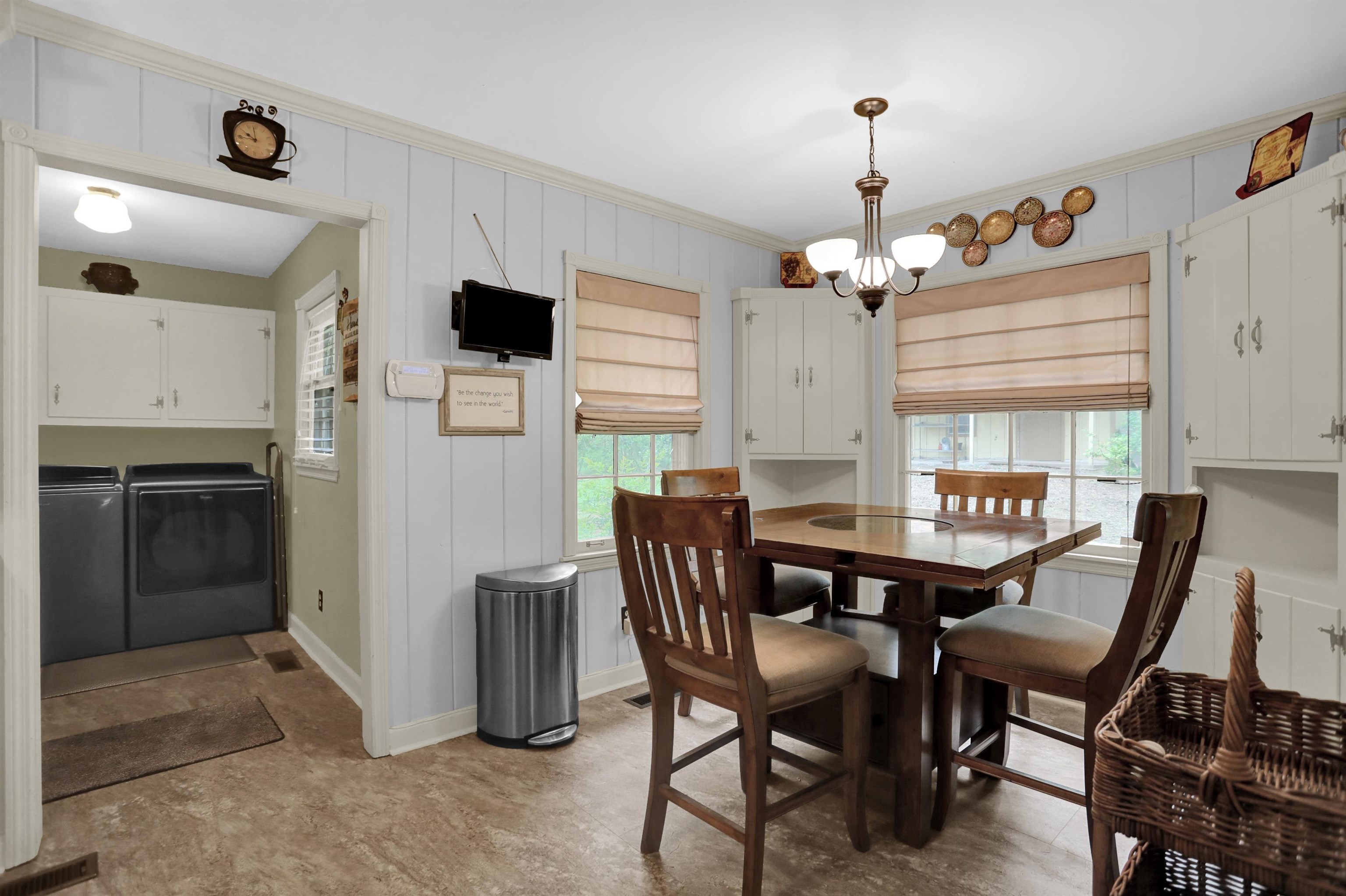 1277 Old Hickory Road Memphis, TN 38116 - Photo 26 of 29 Dining room with crown molding, a notable chandelier, baseboards, visible vents, and washer and clothes dryer