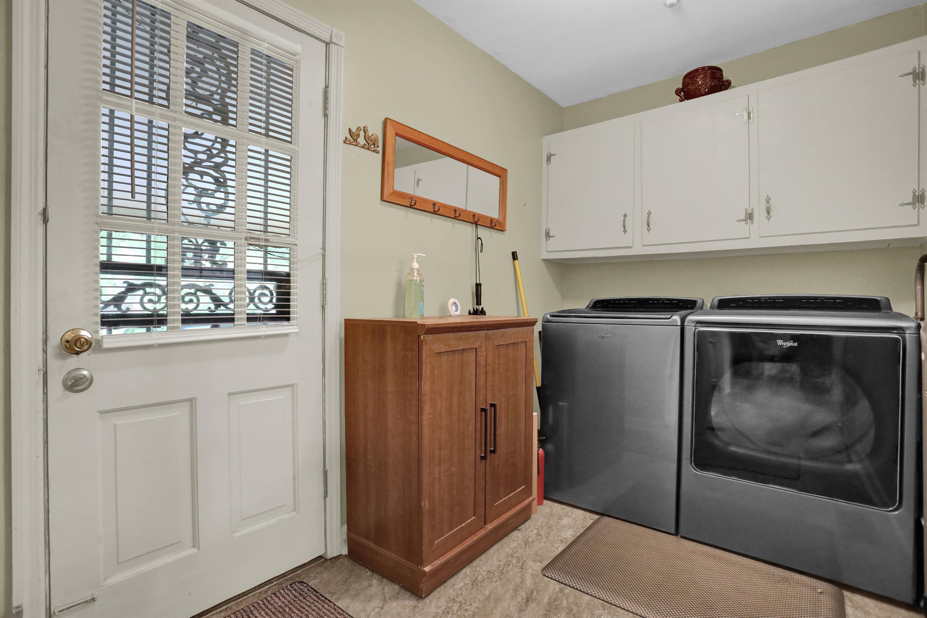 1277 Old Hickory Road Memphis, TN 38116 - Photo 8 of 29 Washroom featuring cabinet space and independent washer and dryer