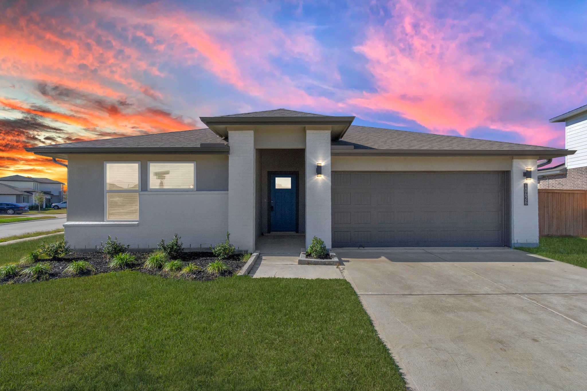 10626 Watershed Drive Rosharon, TX 77583 - Photo 1 of 42 a front view of a house with a garden