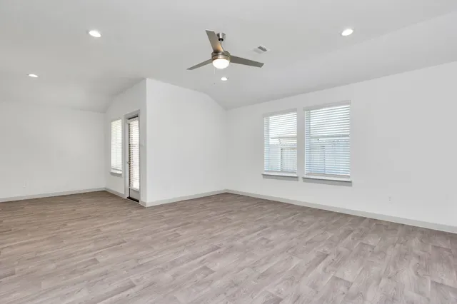 an empty room with windows