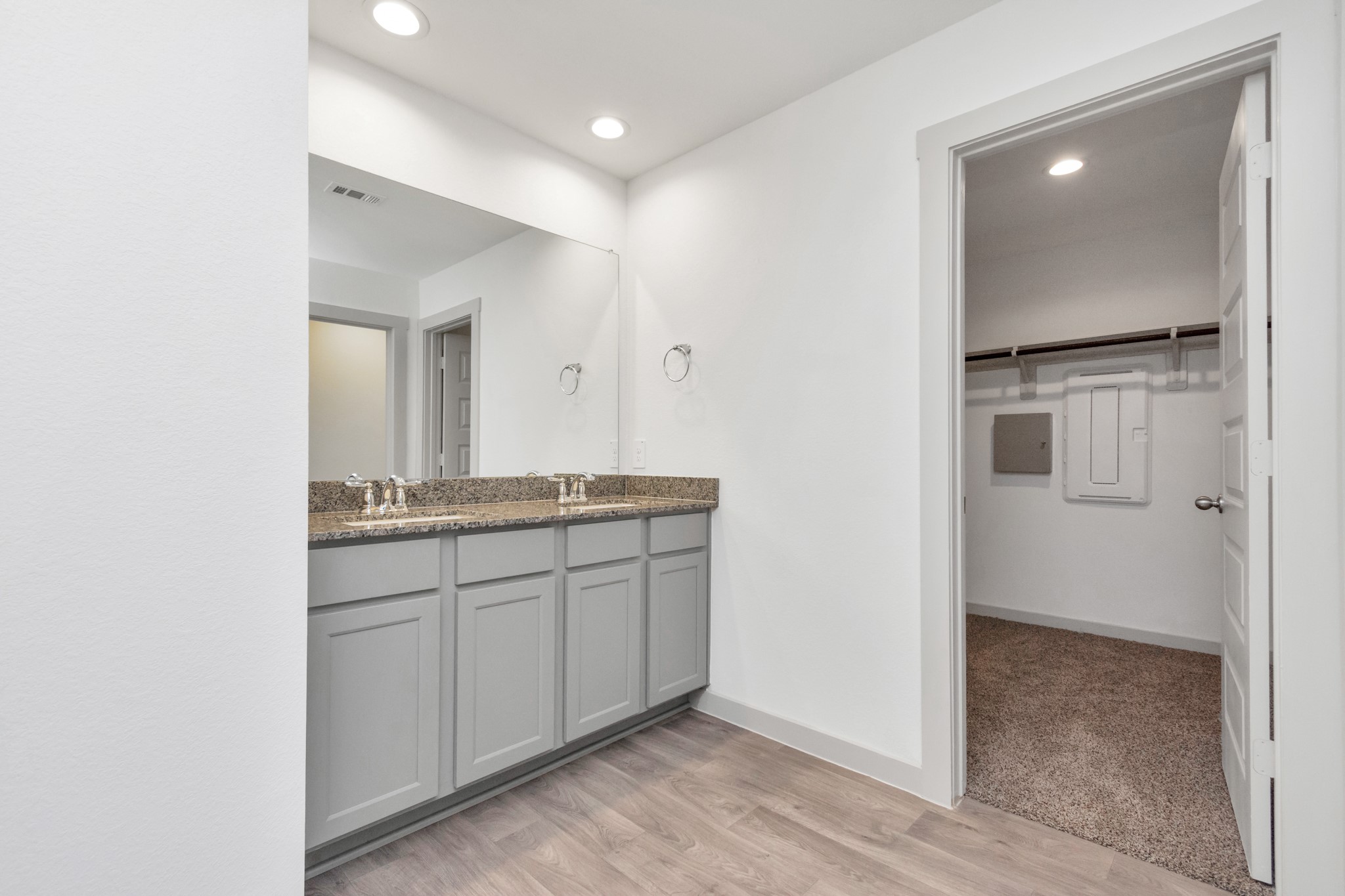 10626 Watershed Drive Rosharon, TX 77583 - Photo 38 of 42 a bathroom with a double vanity sink and mirror