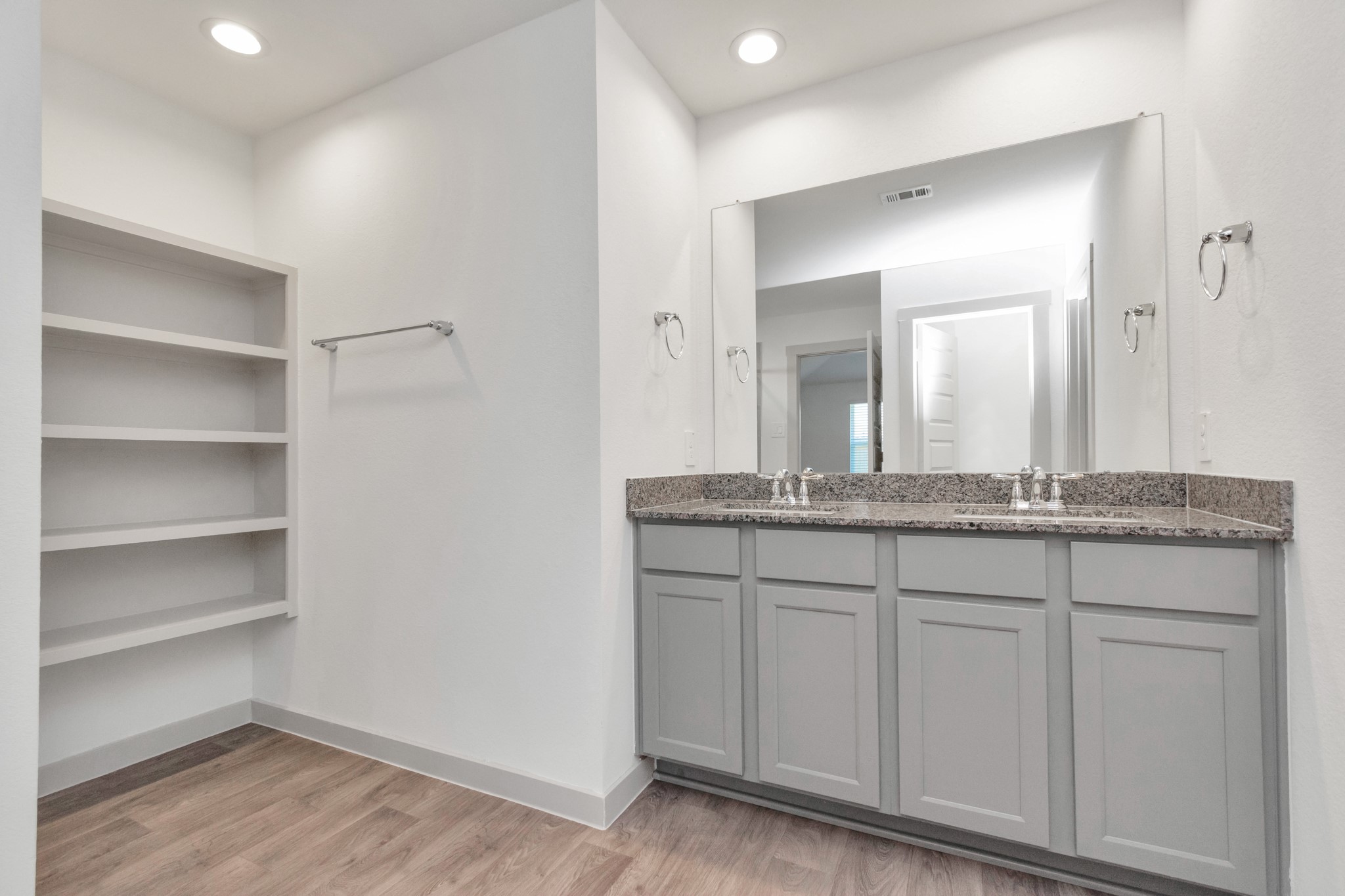 10626 Watershed Drive Rosharon, TX 77583 - Photo 39 of 42 a bathroom with a granite countertop sink and a mirror