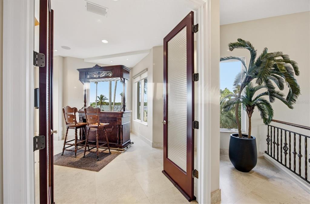 761 Norton Street Longboat Key, FL 34228 - Photo 31 of 66 a view of a livingroom with furniture and floor to ceiling window