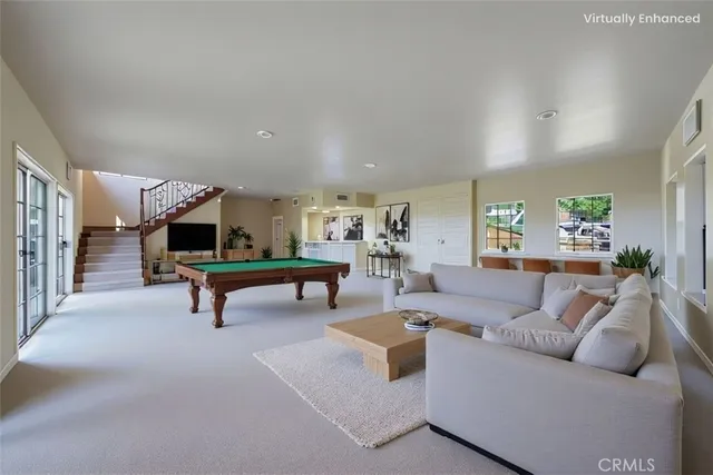 a living room with furniture and a table