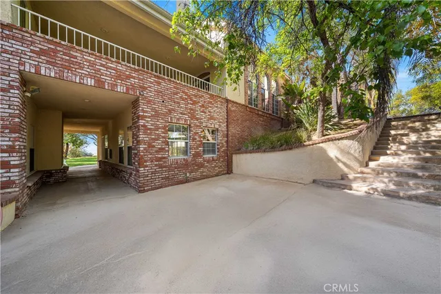 a view of a house with a swimming pool