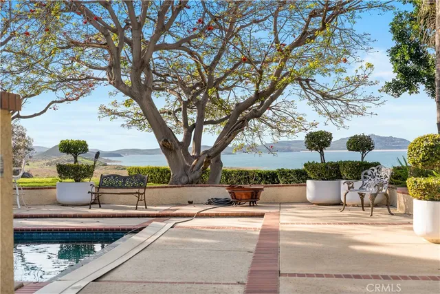 a view of swimming pool from a balcony