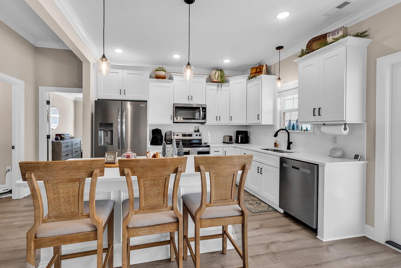 384 William Nobles Road Aynor, SC 29511 - Photo 11 of 38 Kitchen with white cabinetry, appliances with stainless steel finishes, tasteful backsplash, recessed lighting, and decorative light fixtures