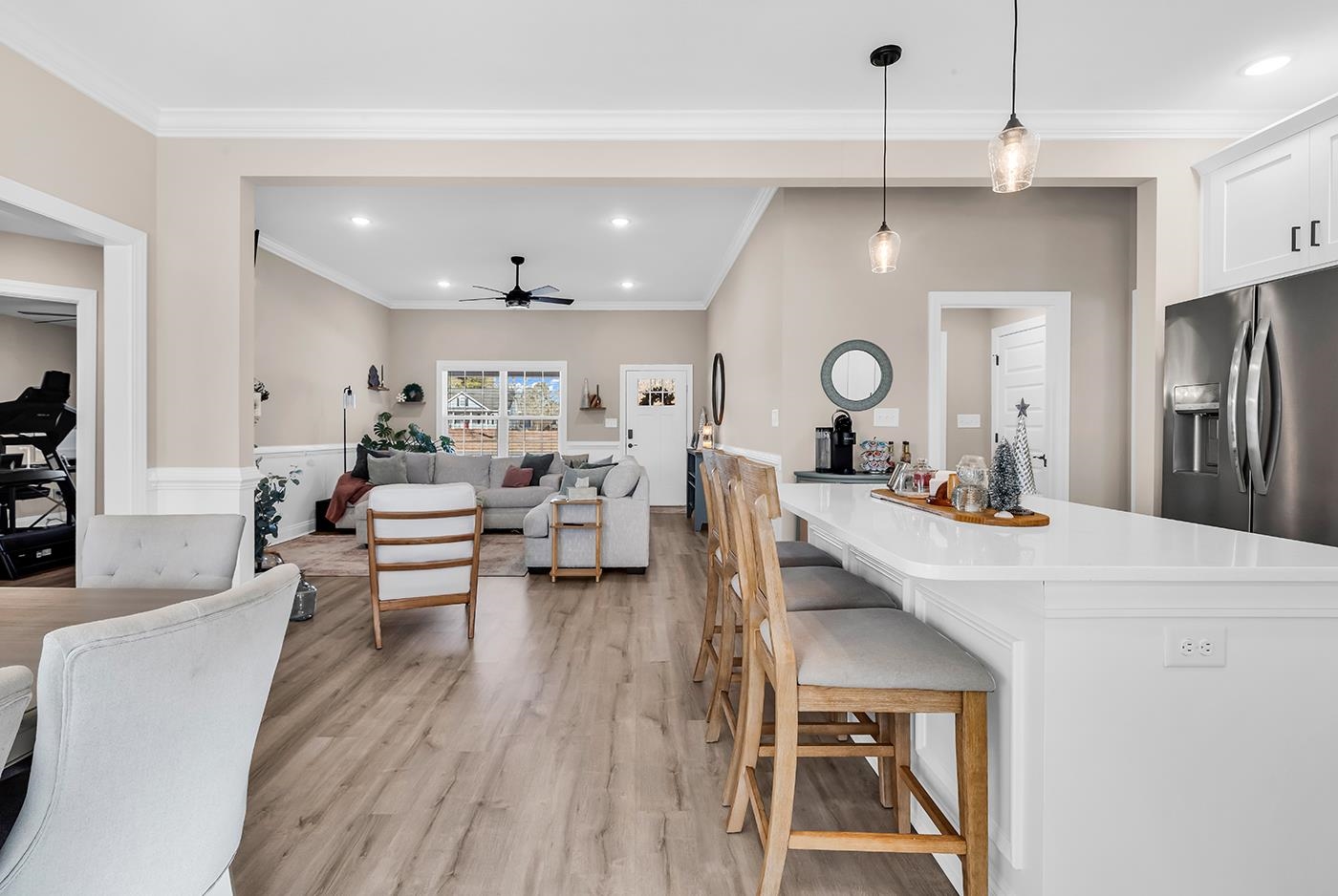 384 William Nobles Road Aynor, SC 29511 - Photo 37 of 38 Kitchen featuring stainless steel fridge with ice dispenser, recessed lighting, pendant lighting, open floor plan, and a kitchen breakfast bar