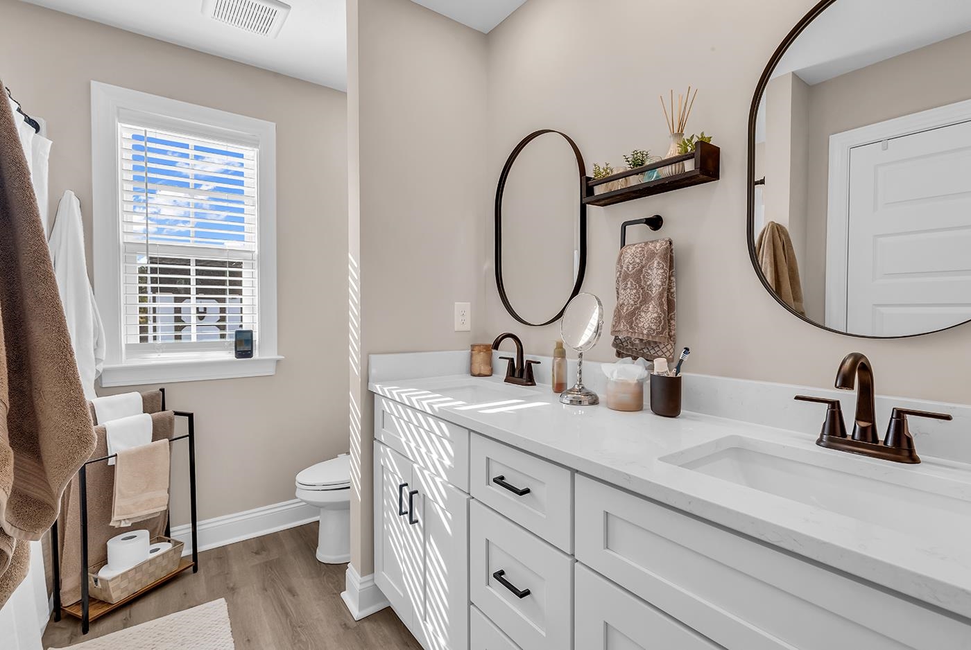 384 William Nobles Road Aynor, SC 29511 - Photo 22 of 38 Bathroom with double vanity and light wood-style floors