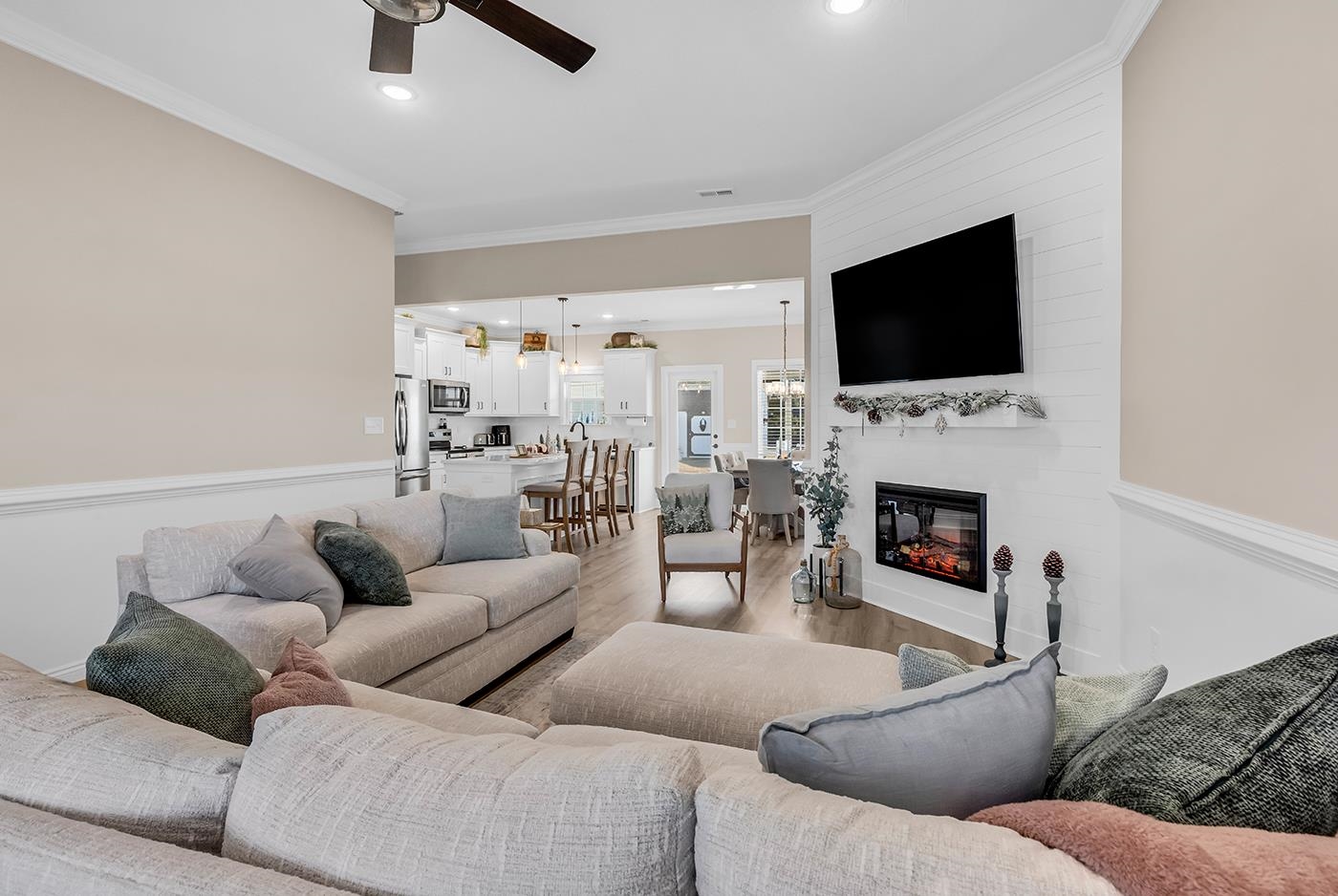384 William Nobles Road Aynor, SC 29511 - Photo 5 of 38 Living room featuring crown molding, a large fireplace, recessed lighting, wood finished floors, and ceiling fan
