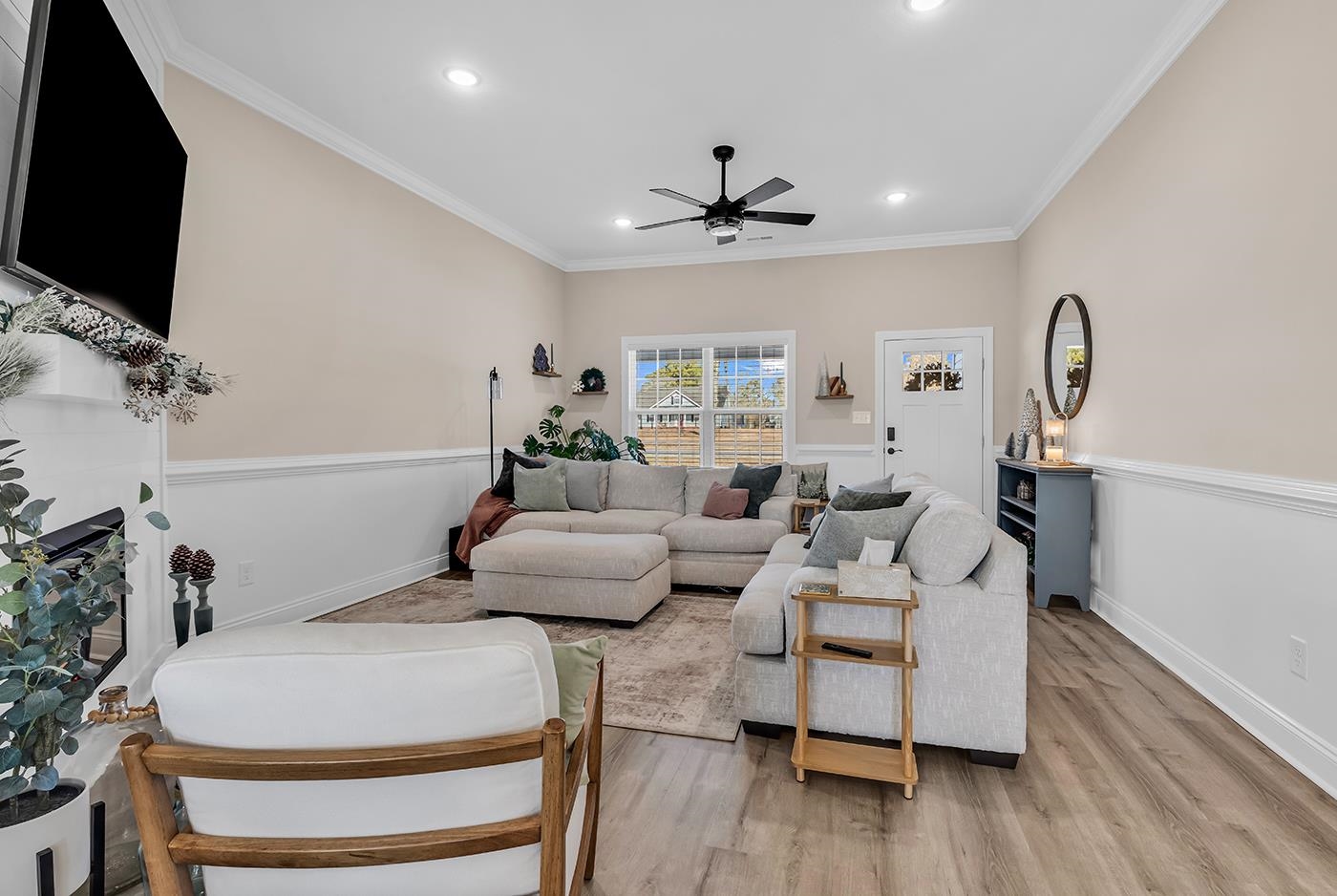 384 William Nobles Road Aynor, SC 29511 - Photo 7 of 38 Living area with recessed lighting, light wood-style flooring, ornamental molding, a fireplace, and a ceiling fan