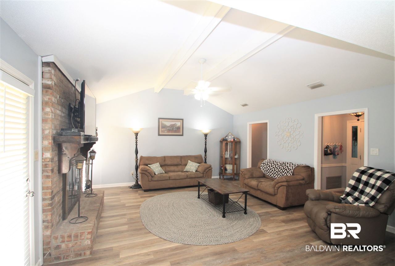 137 Michael Loop Daphne, AL 36526 - Photo 2 of 29 Freshly Painted! New LVP flooring. Woodburning FP