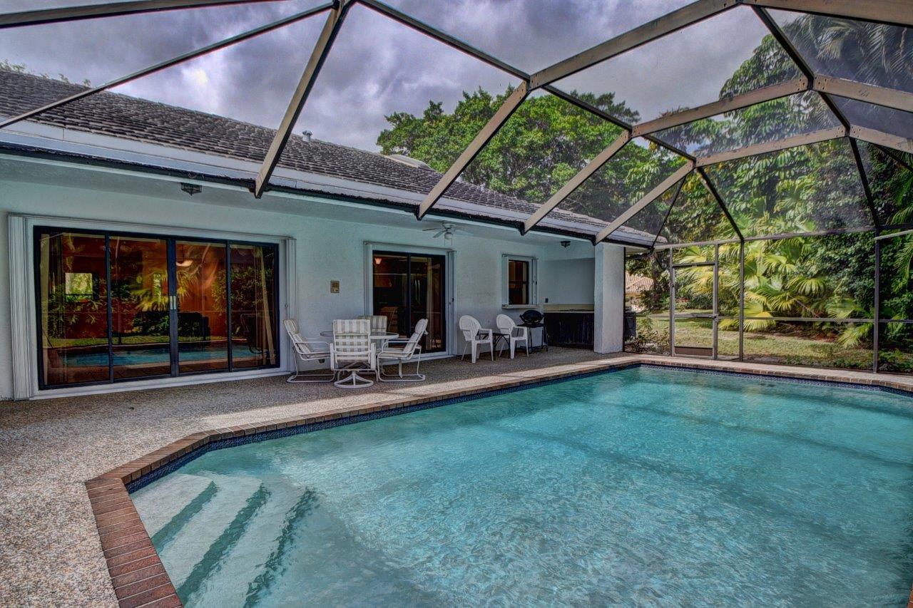 4460 Northwest 27th Avenue Boca Raton, FL 33434 - Photo 31 of 44 Screened Covered Patio