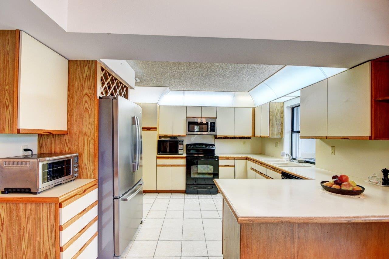 4460 Northwest 27th Avenue Boca Raton, FL 33434 - Photo 9 of 44 Spacious Kitchen