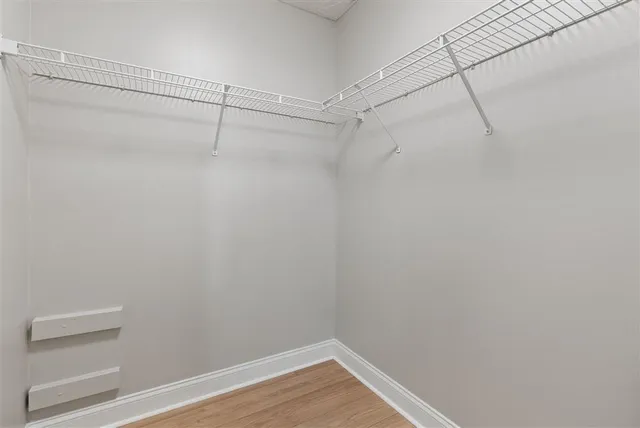 a view of a room with racks on the wall