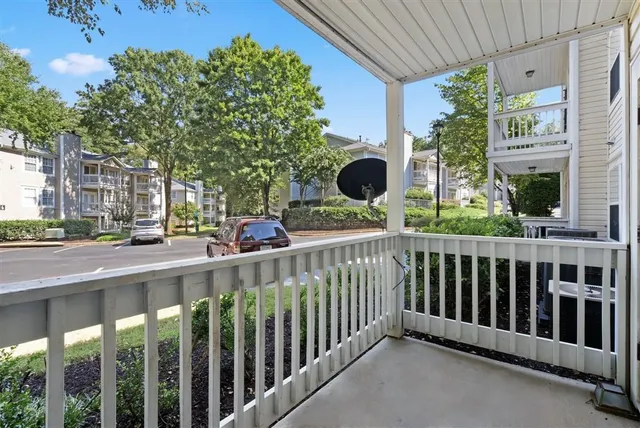 a view of street from balcony