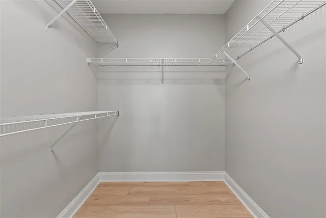 a view of a room with racks on the wall