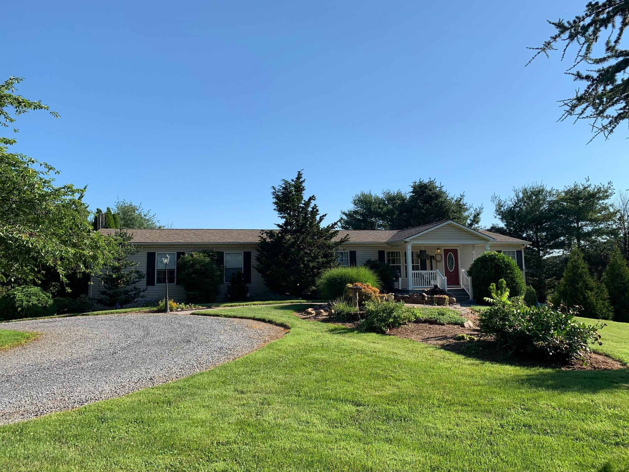 365 Fadley Road Weyers Cave, VA 24486 - Photo 1 of 1 a front view of house with yard and green space