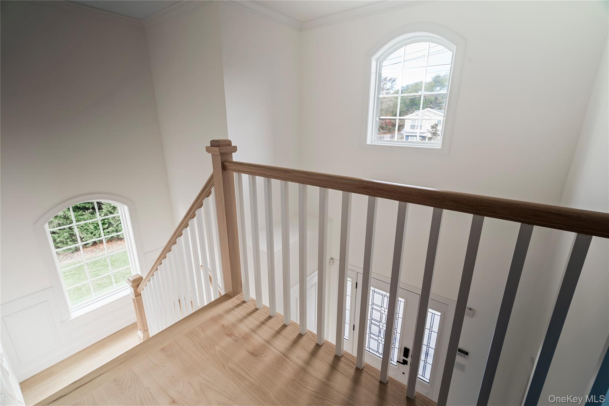 60 Parsnip Pond Road Lake Grove, NY 11755 - Photo 26 of 32 a view of an entryway with wooden floor