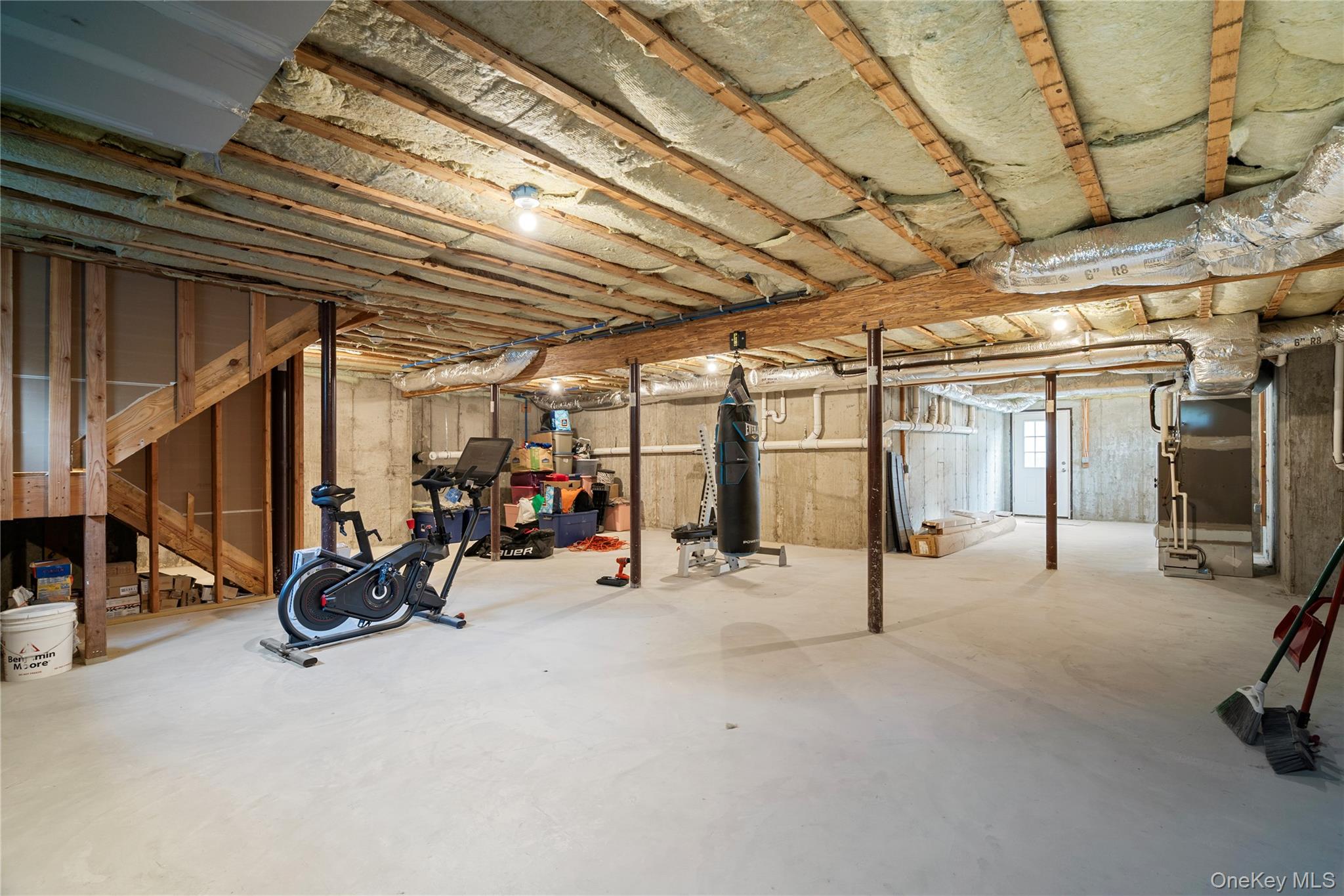 60 Parsnip Pond Road Lake Grove, NY 11755 - Photo 27 of 32 a view of a room with gym equipment