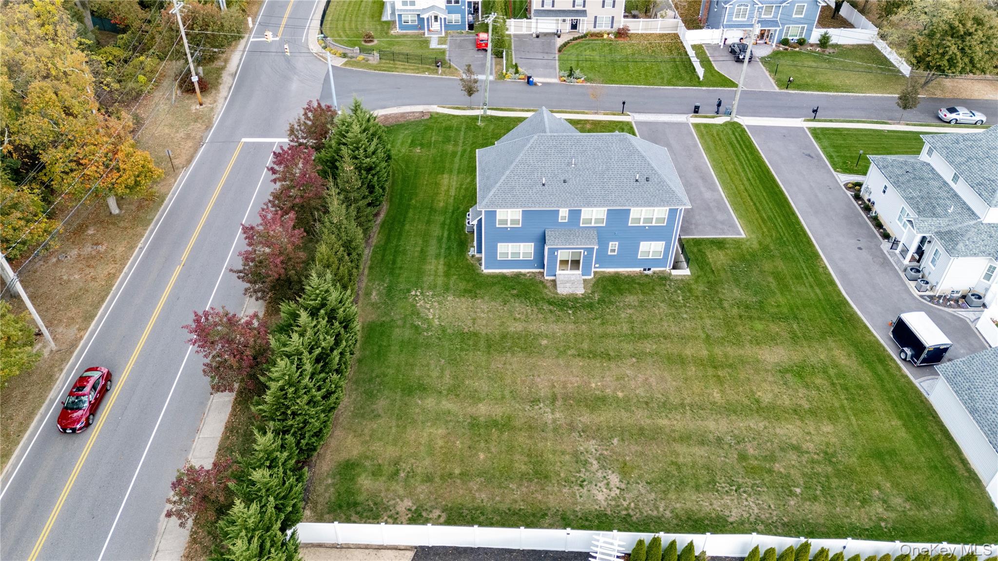 60 Parsnip Pond Road Lake Grove, NY 11755 - Photo 6 of 32 a view of a house with a yard