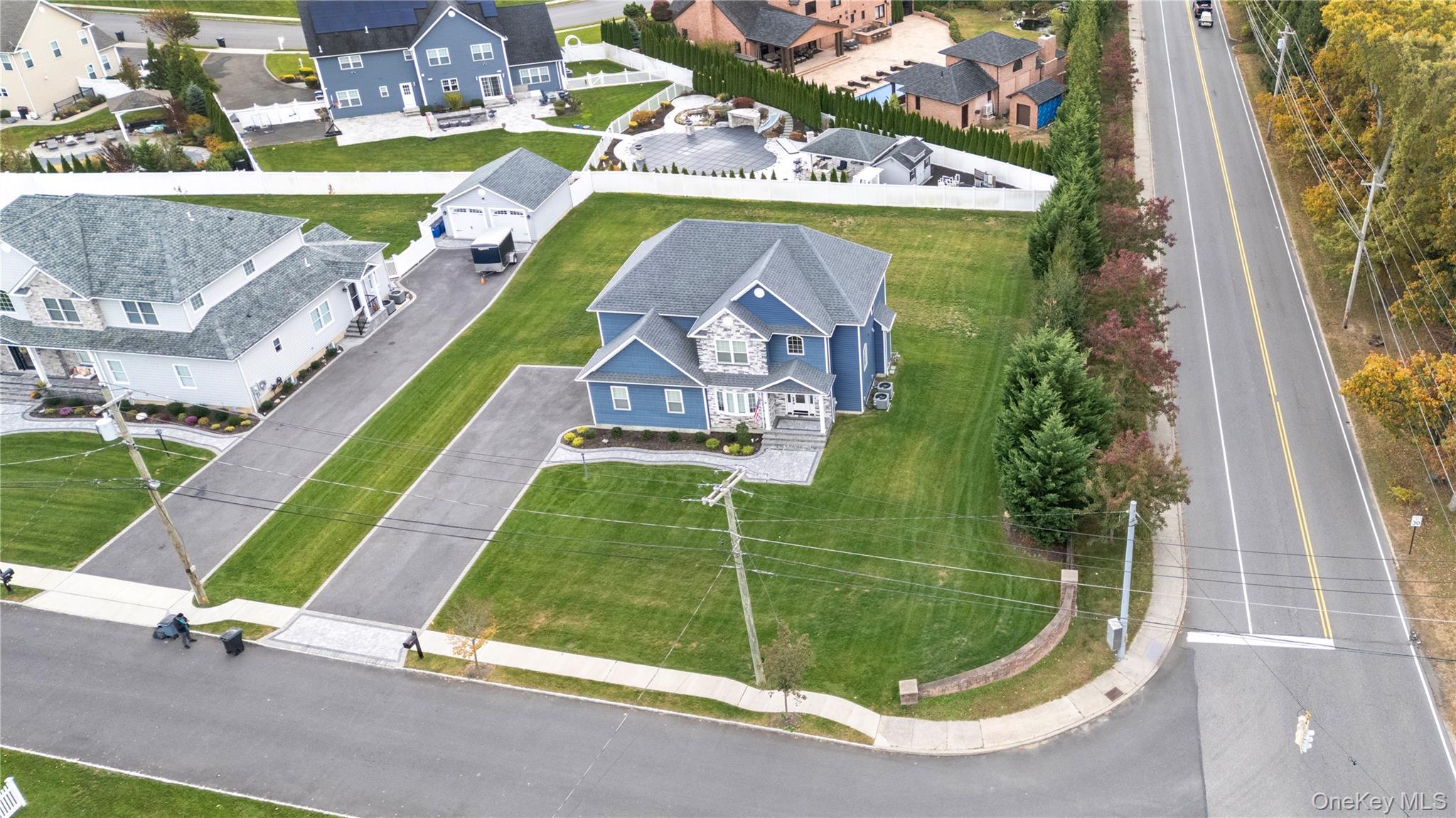 60 Parsnip Pond Road Lake Grove, NY 11755 - Photo 8 of 32 an aerial view of a house