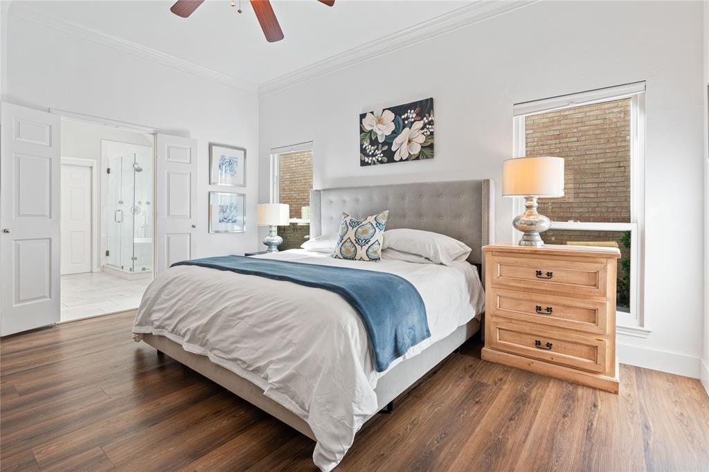 8718 Falls Road Irving, TX 75063 - Photo 14 of 28 a bedroom with a bed and a window