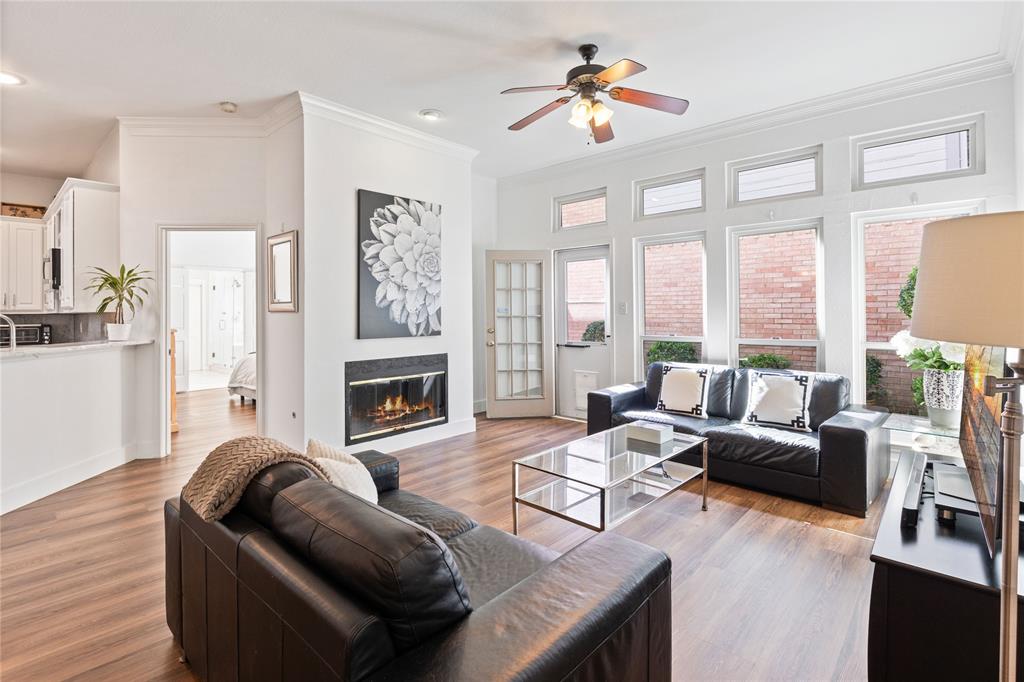 8718 Falls Road Irving, TX 75063 - Photo 7 of 28 a living room with furniture fireplace and flat screen tv