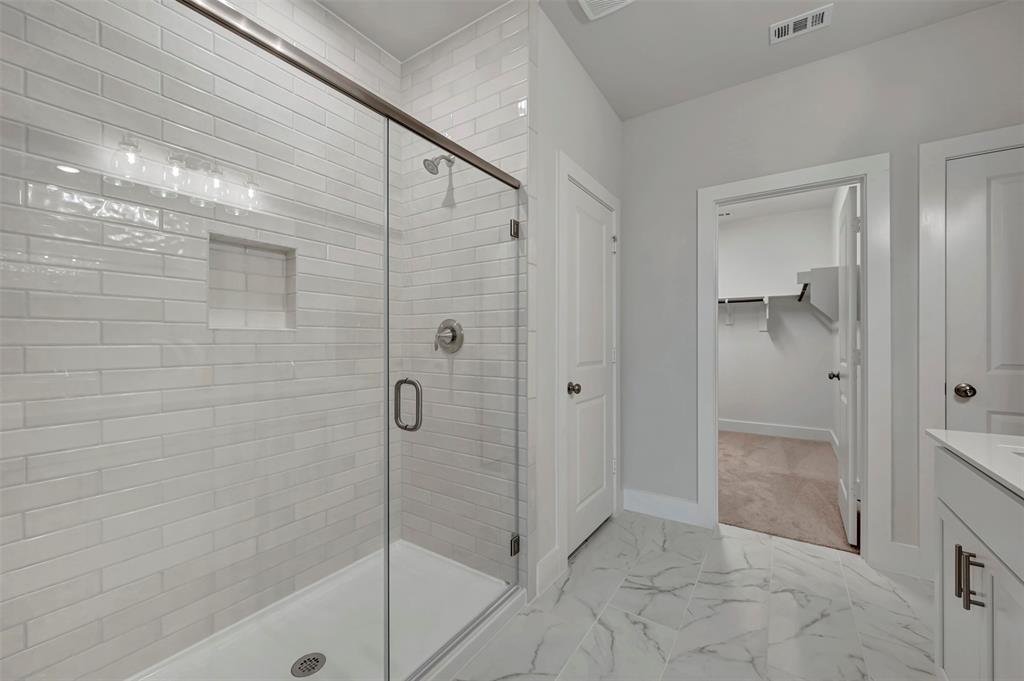 2624 Lewisville Road Celina, TX 75009 - Photo 12 of 40 a bathroom with a shower and a sink