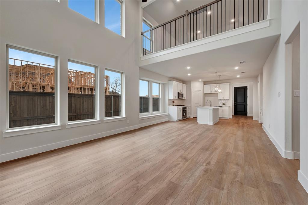 2624 Lewisville Road Celina, TX 75009 - Photo 23 of 40 a view of an entryway with wooden floor
