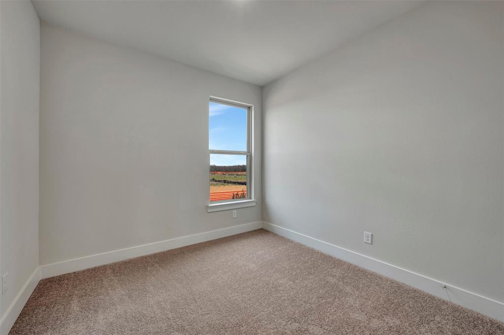 2624 Lewisville Road Celina, TX 75009 - Photo 27 of 40 an empty room with a window