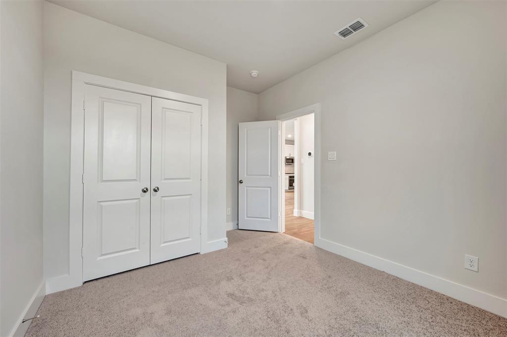 2624 Lewisville Road Celina, TX 75009 - Photo 28 of 40 a view of an empty room and closet area