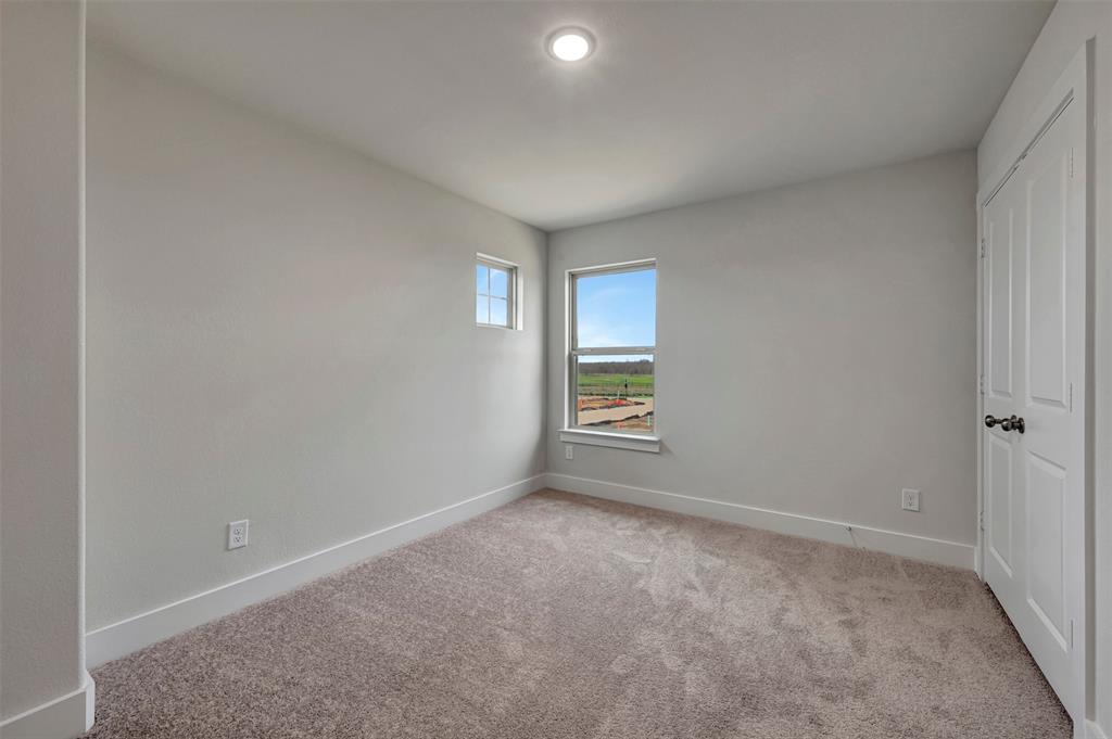 2624 Lewisville Road Celina, TX 75009 - Photo 32 of 40 a view of an empty room with a window