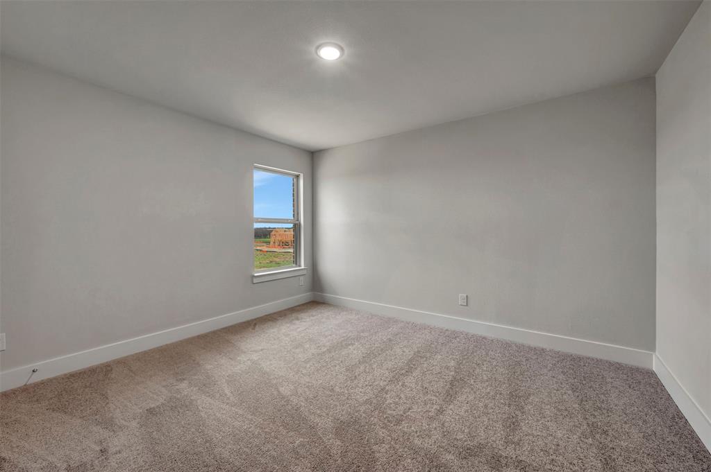 2624 Lewisville Road Celina, TX 75009 - Photo 35 of 40 an empty room with windows