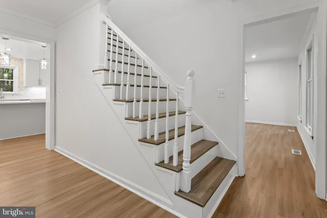 a view of entryway with wooden floor