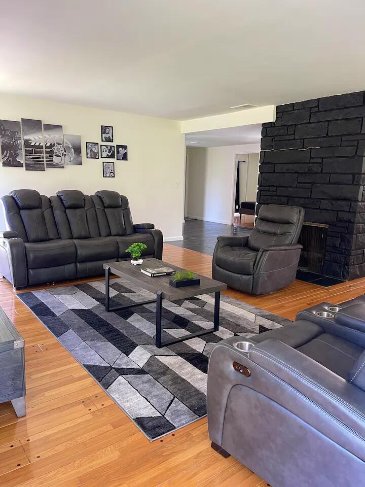 9748 Oak Pass Road Beverly Hills, CA 90210 - Photo 14 of 35 a living room with furniture and wooden floor