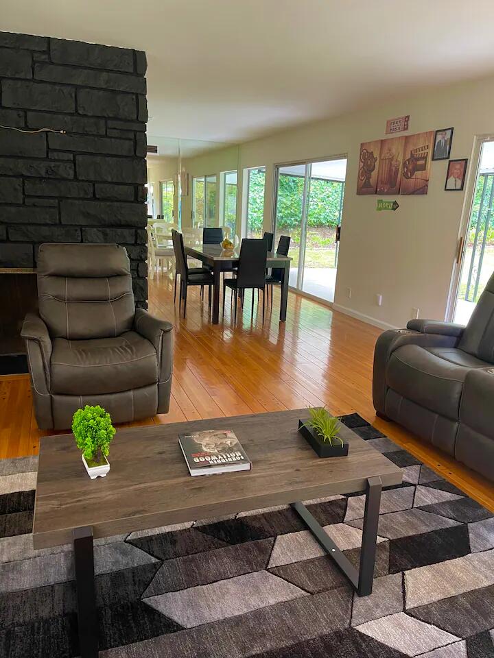 9748 Oak Pass Road Beverly Hills, CA 90210 - Photo 26 of 35 a living room with furniture and wooden floor