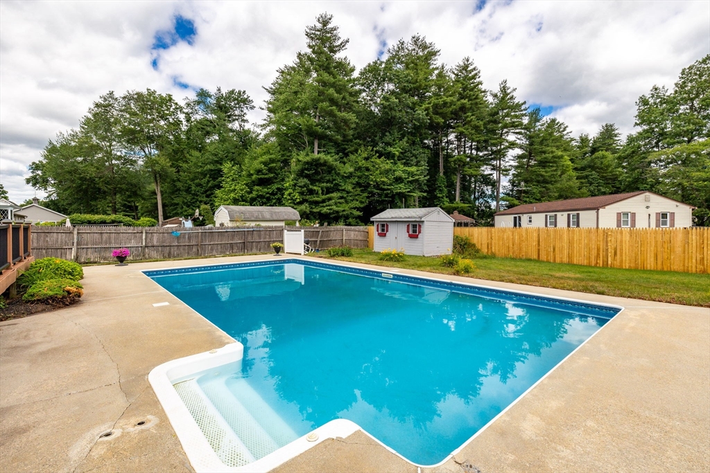 366 Peekskill Avenue Springfield, MA 01129 - Photo 12 of 31 a view of a swimming pool with a patio