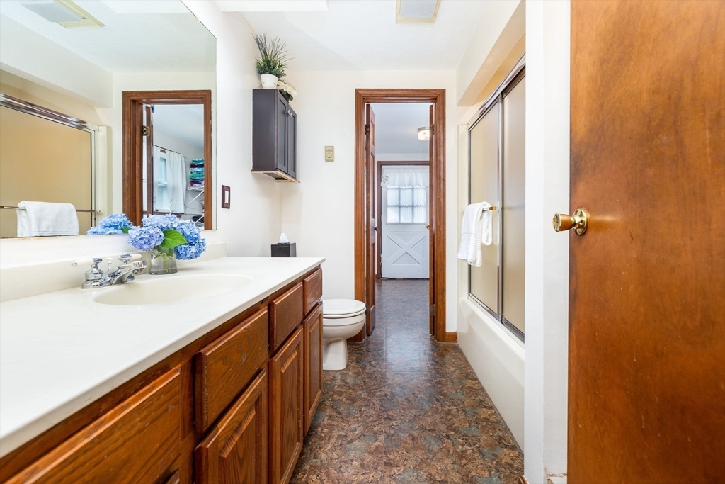 366 Peekskill Avenue Springfield, MA 01129 - Photo 20 of 31 a bathroom with a sink a toilet and shower