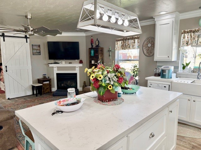 59 Private Road Dayton, TX 77535 - Photo 7 of 13 a kitchen with a sink a microwave and cabinets