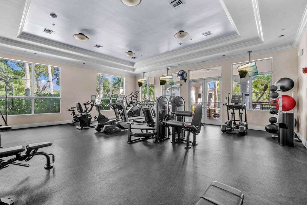1690 Renaissance Commons Boulevard, Unit 1219 Boynton Beach, FL 33426 - Photo 38 of 38 a view of a room with gym equipment