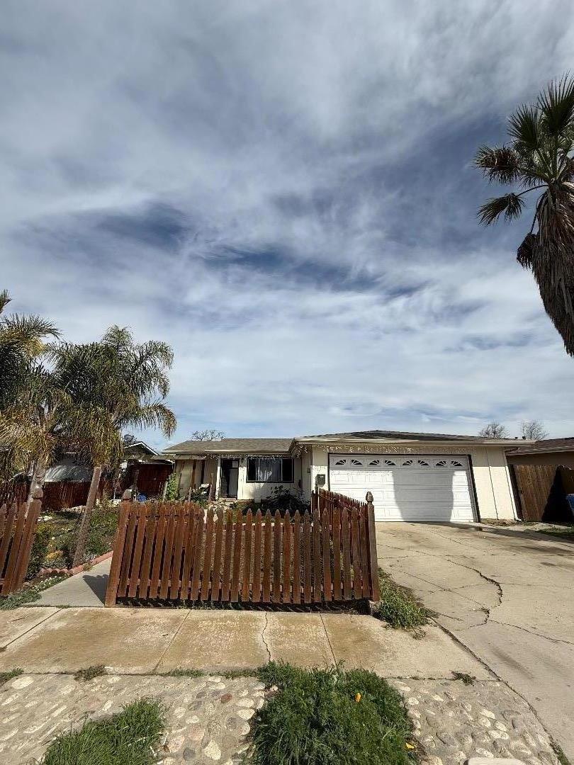 244 Larson Lane Greenfield, CA 93927 - Photo 2 of 5 a view of house with a yard