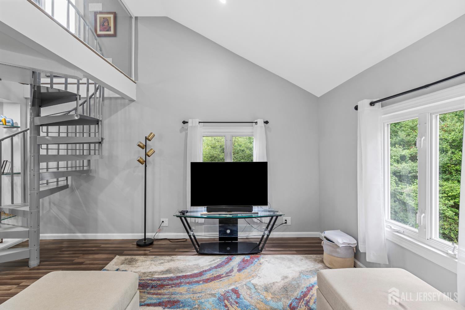 6 Kates Mount Iselin, NJ 08830 - Photo 12 of 29 a living room with a flat screen tv and a window