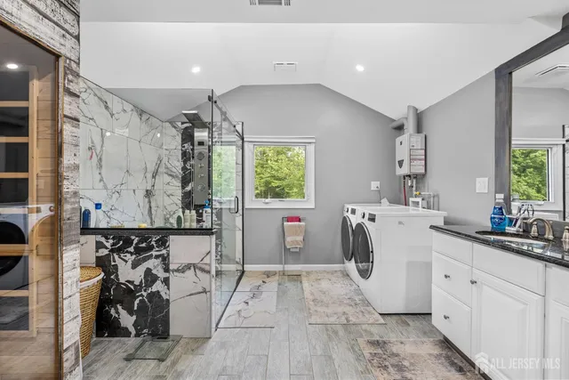 a view of a kitchen with appliances and cabinets