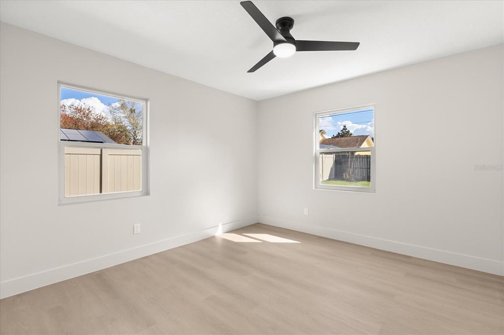 206 Graham Road Fern Park, FL 32730 - Photo 23 of 34 a view of room with window and ceiling fan