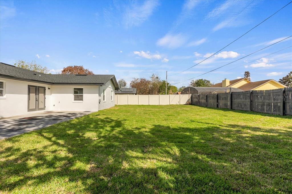 206 Graham Road Fern Park, FL 32730 - Photo 29 of 34 a view of an house with backyard space and balcony