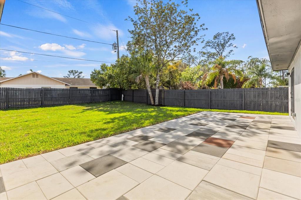206 Graham Road Fern Park, FL 32730 - Photo 30 of 34 a view of a backyard with a large tree