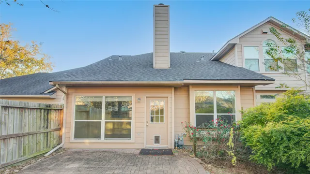 a house view with a garden space