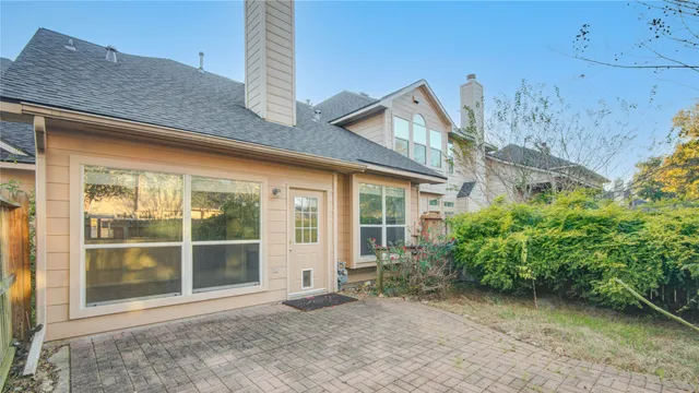 a view of a house with a garden