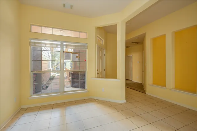 a view of an empty room with window